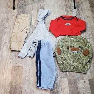 assortment of 6 month baby clothes